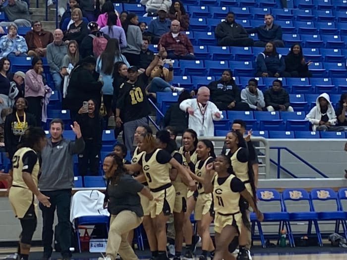 Central players celebrate the win. (Photo by Jeff Halpern)